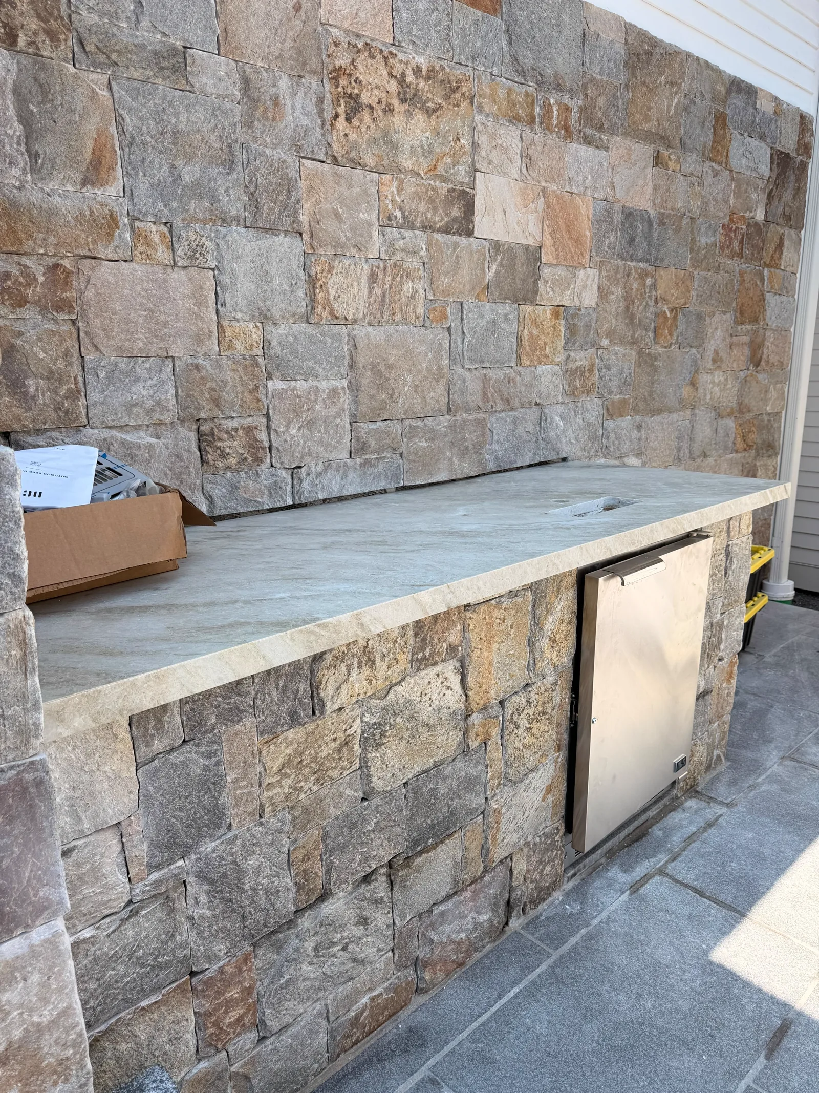 2 inch mitered edge detail on Taj Mahal Quartzite countertop