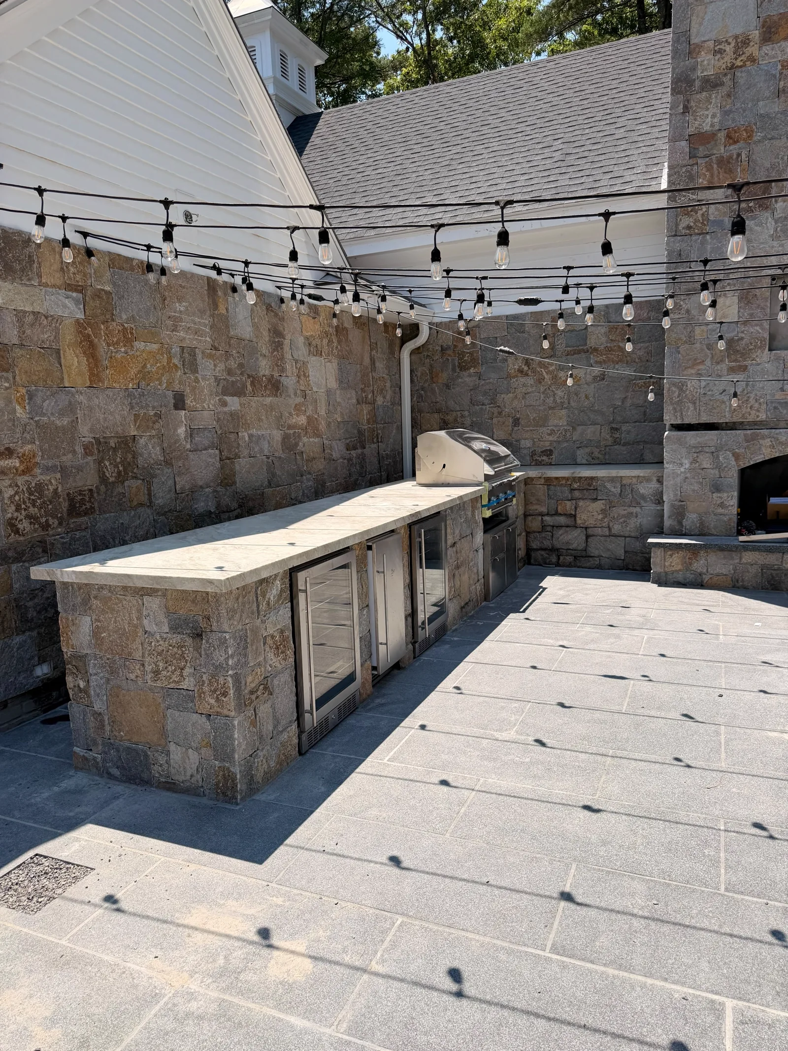 Outdoor kitchen countertop wide view in Concord MA